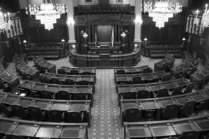 Empty black and white legislative chamber at the Illinois state capitol