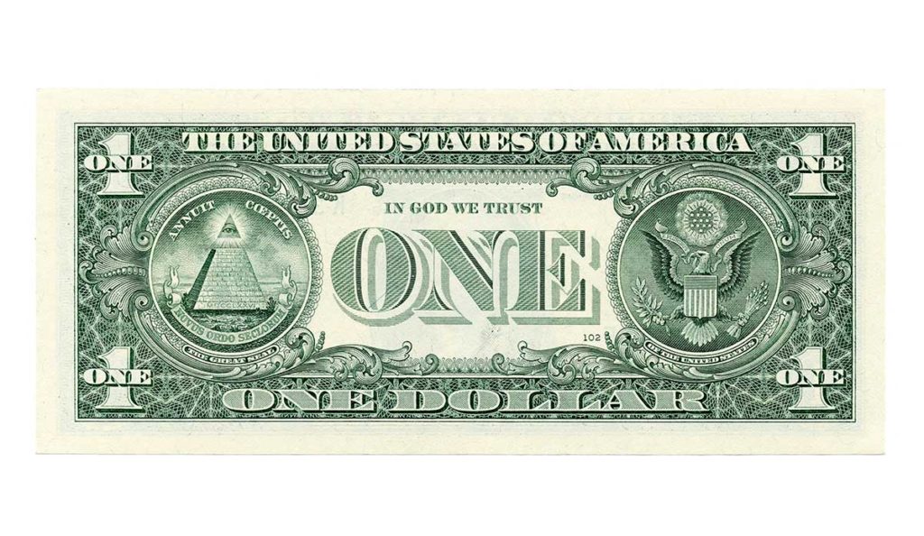 Reverse side of a dollar bill