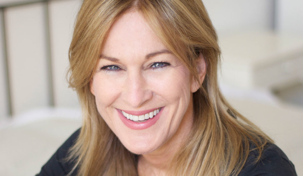 a woman smiling at the camera