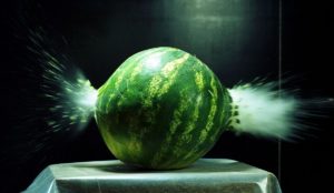 a watermelon with a watermelon exploding
