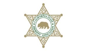 a star shaped badge with a bear