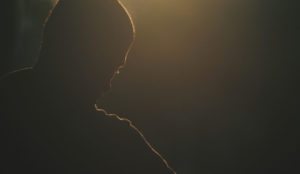 Silhouette of a young man