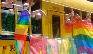 a group of people on a school bus