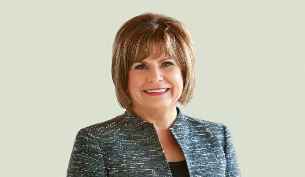 a woman smiling at camera