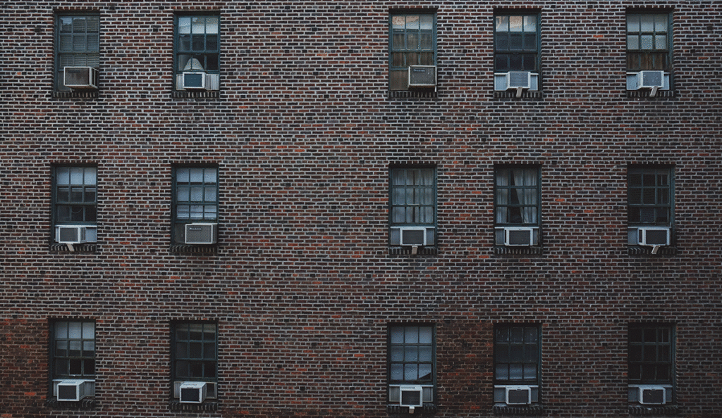 a brick building with air conditioning