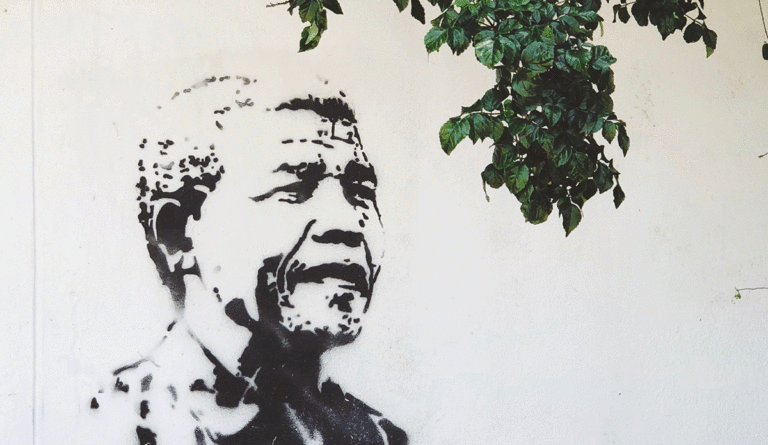 a black and white stencil of a man