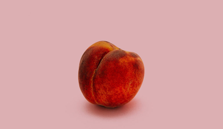 a close up of a peach