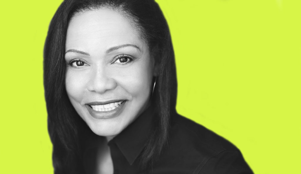 a woman smiling at the camera