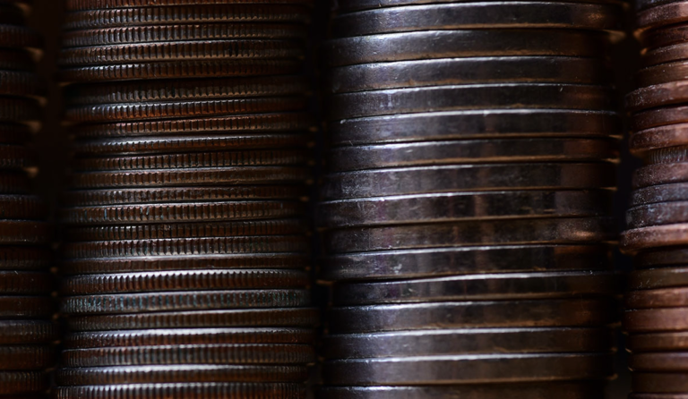 a close up of a stack of coins