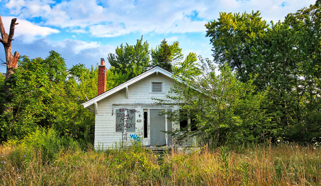 a house with graffiti on it