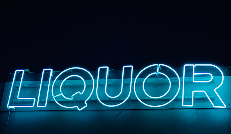 a neon sign with letters on it