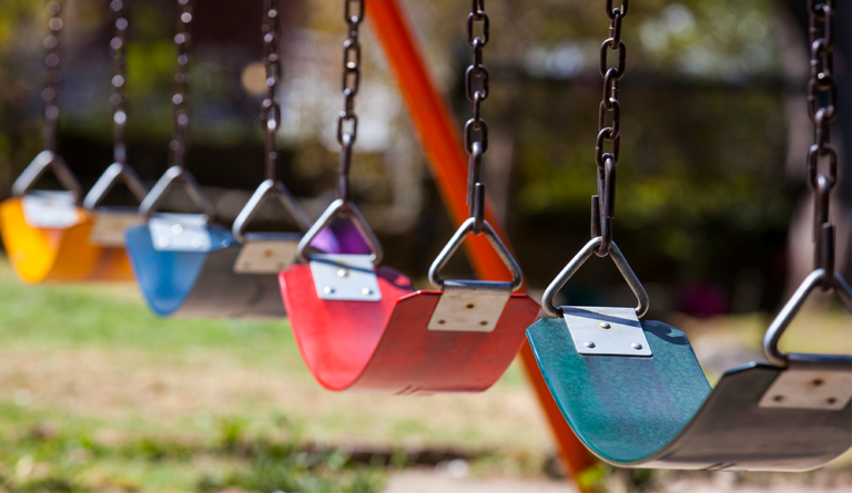 a group of colorful swings