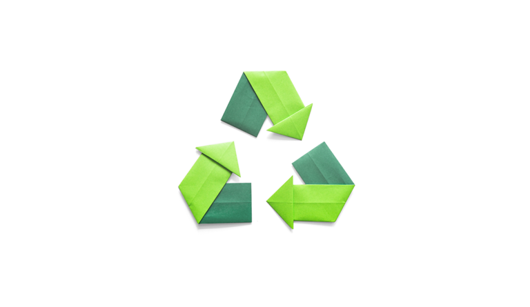 a green recycle symbol made from paper