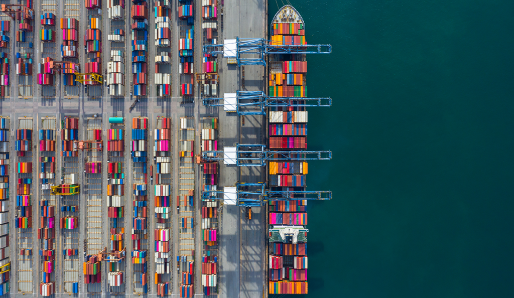a container ship with many containers on the side
