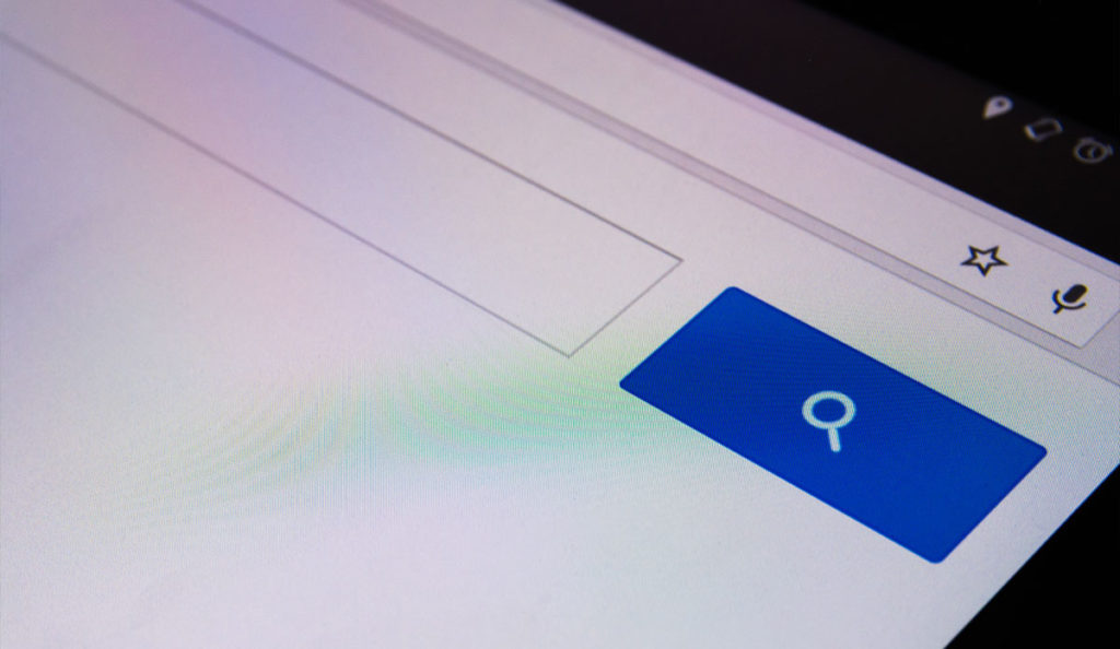 a close up of a blue and white button