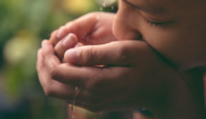 a person washing their hands