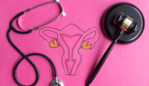 a drawing of uterus and a stethoscope