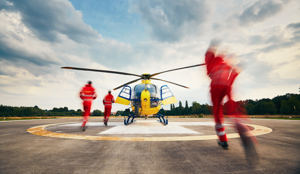 a group of people walking on a helicopter