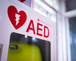 An automated external defibrillator (AED) in a white box is an emergency defibrillator for people in cardiac arrest.