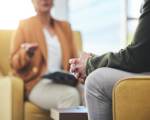 man having a talk therapy session with his therapist