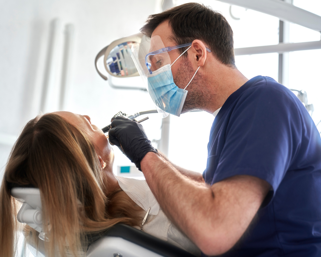 Dentist working on patient's teeth