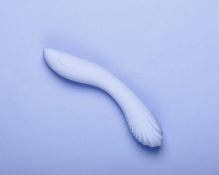 blue vibrating sex toy on a blue background