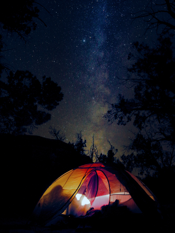 Astrophotograph of a tent and the night sky. Taken by Rowena Lindsay