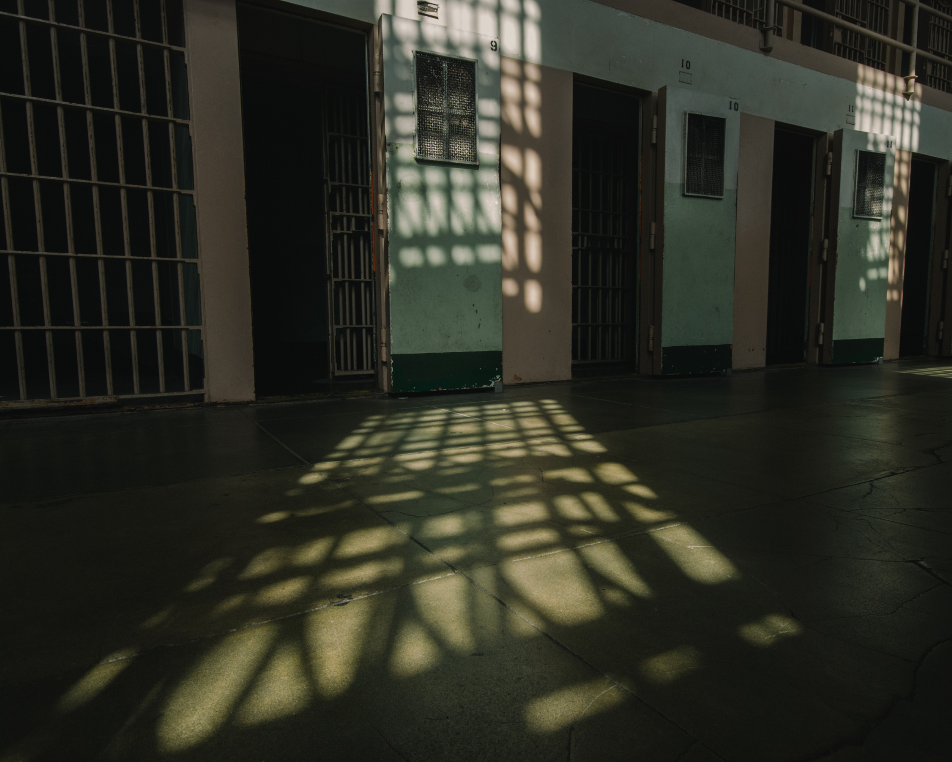 Shadows on a jail cell block