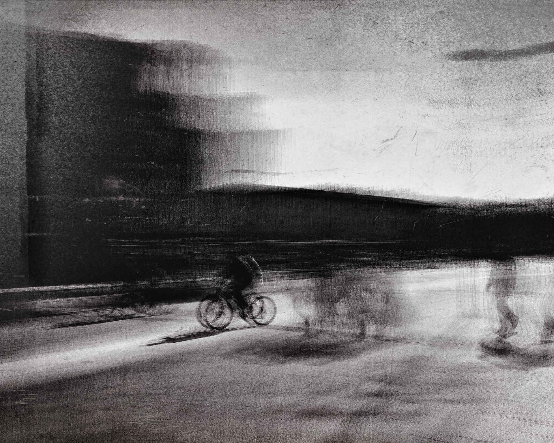 Black and white, blurred motion photo of people in the street