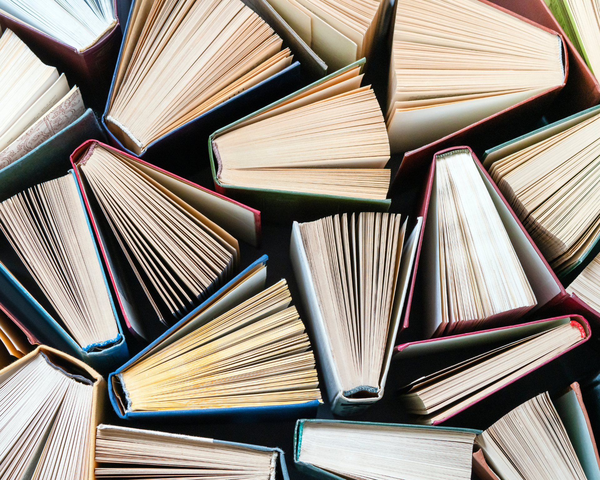 Collage of fanned out books. Libraries concept