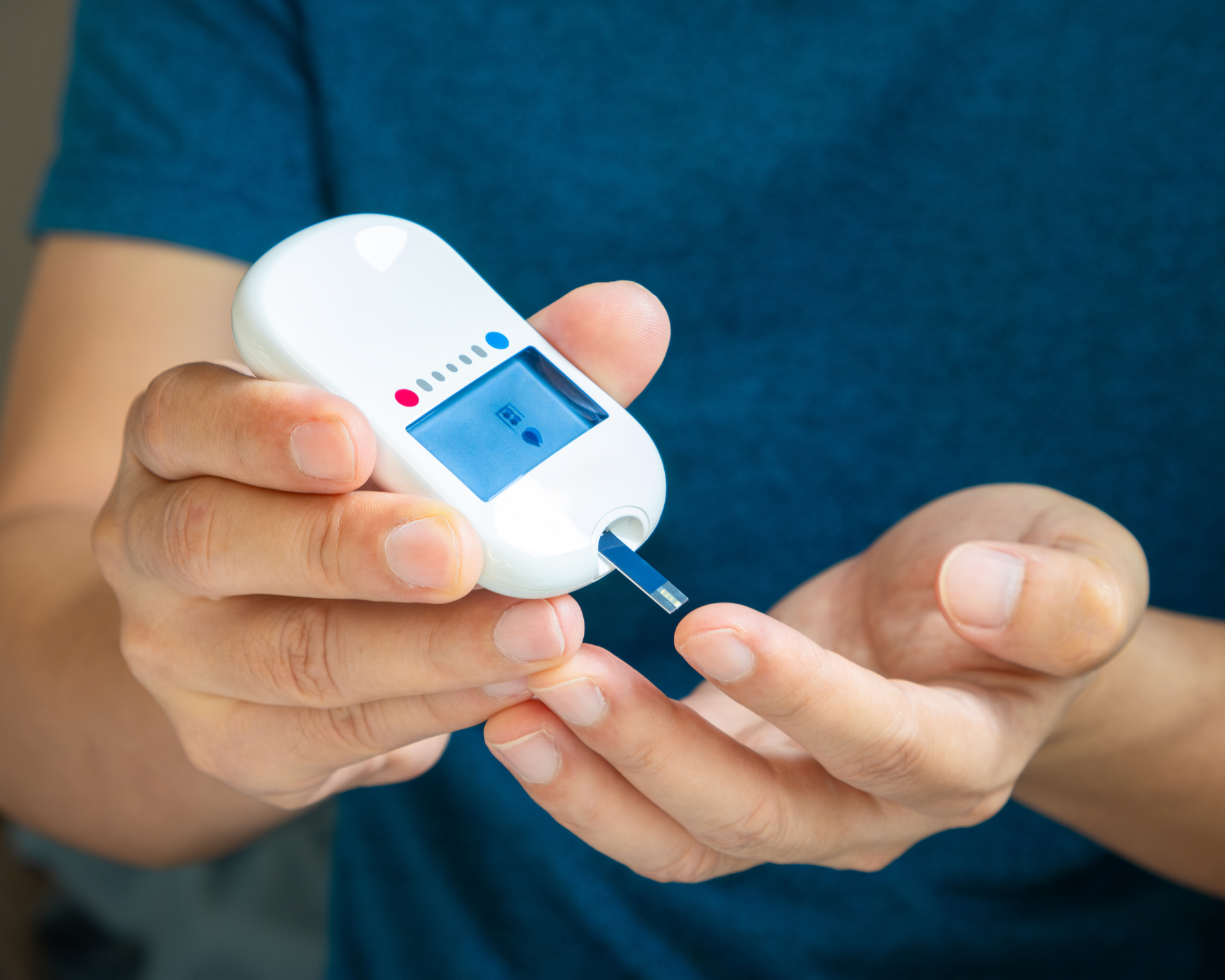 close-up image of a diabetic patient testing their blood sugar