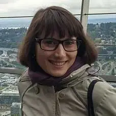 a woman smiling at the camera
