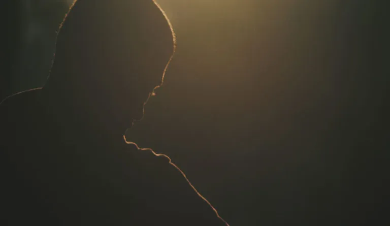 Silhouette of a young man