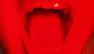 A red photo of an open mouth