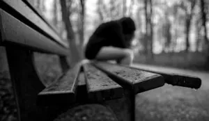 a person sitting on a bench