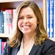 a woman smiling at camera