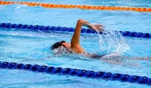 a person swimming in a pool
