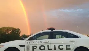 Lincoln Nebraska police car and a rainbow