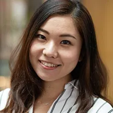 a woman smiling at the camera