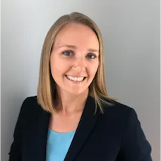 a woman smiling at camera