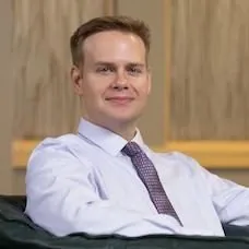 a man in a white shirt and tie