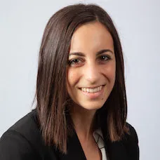 a woman smiling at the camera
