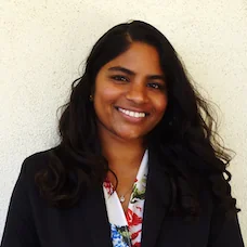 a woman smiling at camera