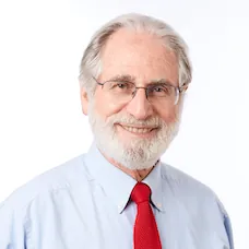 a man with a beard and a red tie