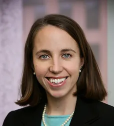 a close-up of a woman smiling