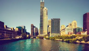 a river with a city in the background