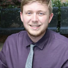 a man smiling for the camera