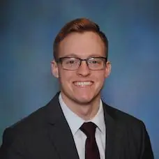 a man in a suit and tie