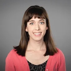 a woman smiling for a picture