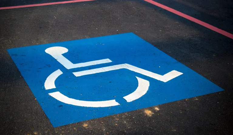 a blue sign on the road